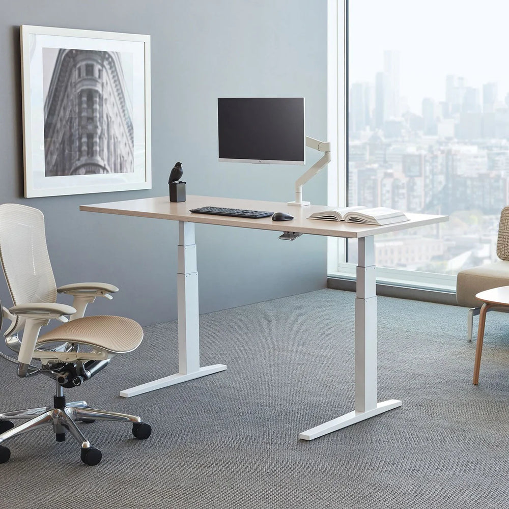 Table réglable en hauteur à contrepoids