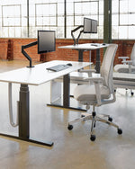 Table réglable en hauteur à contrepoids